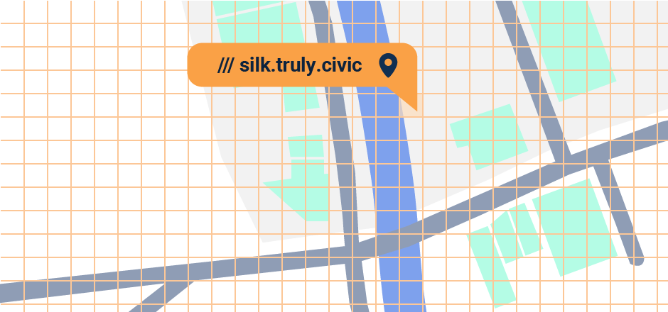 Illustration of streets by a river with a grid laid over. one square of the grid is highlighted and tagged with a w3w address